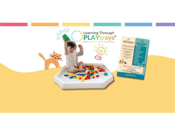 Large white Tuff Tray filled with colorful building blocks for open-ended sensory play and early years construction activity