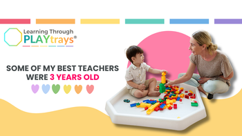 teacher and child playing with a white tuff tray blocks activity 