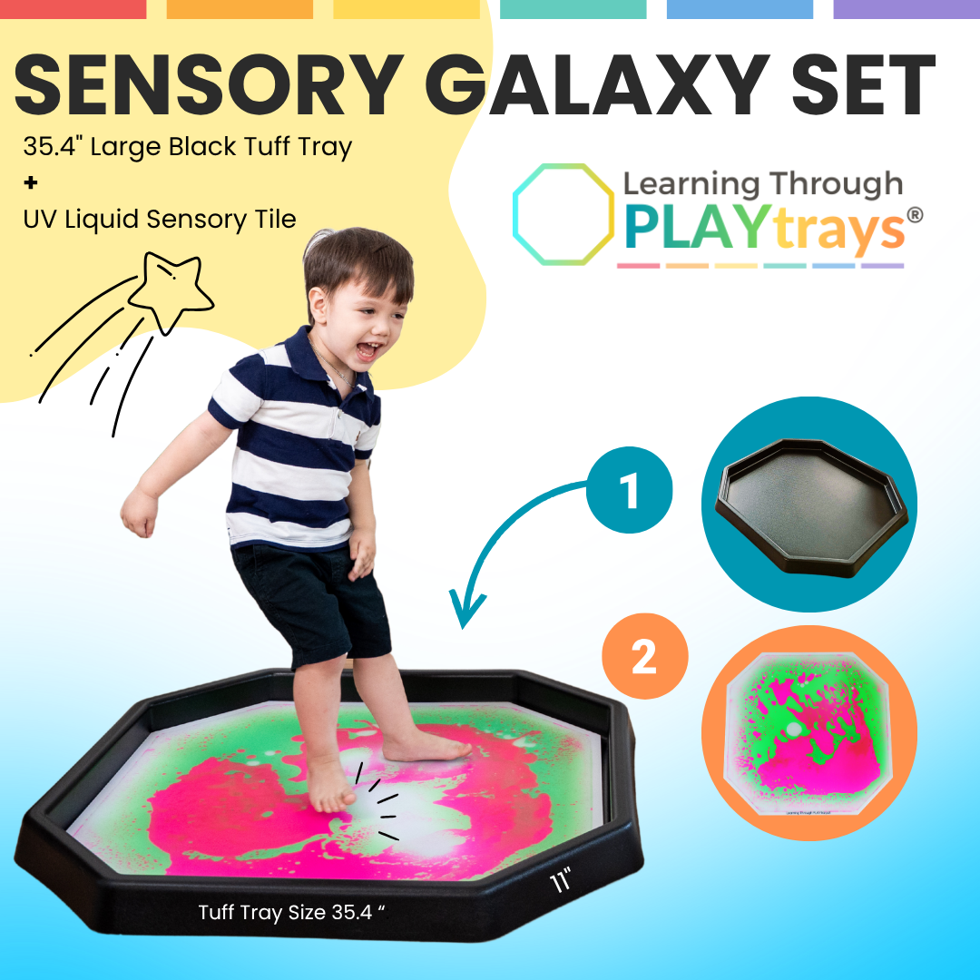 Child playing with a Sensory Galaxy Set from Learning Through PLAYtrays, featuring a large black tuff tray and UV liquid sensory tile.