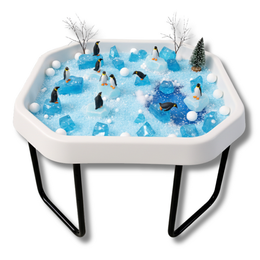 White Tuff Tray and adjustable stand with sensory play setup featuring penguin figures and ice blocks
