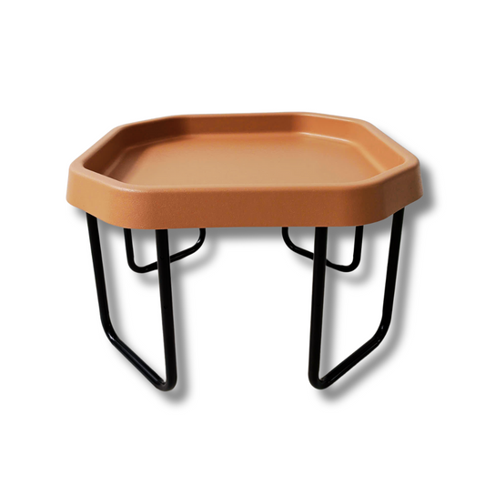 Small brown tuff tray with black adjustable stand for sensory play.