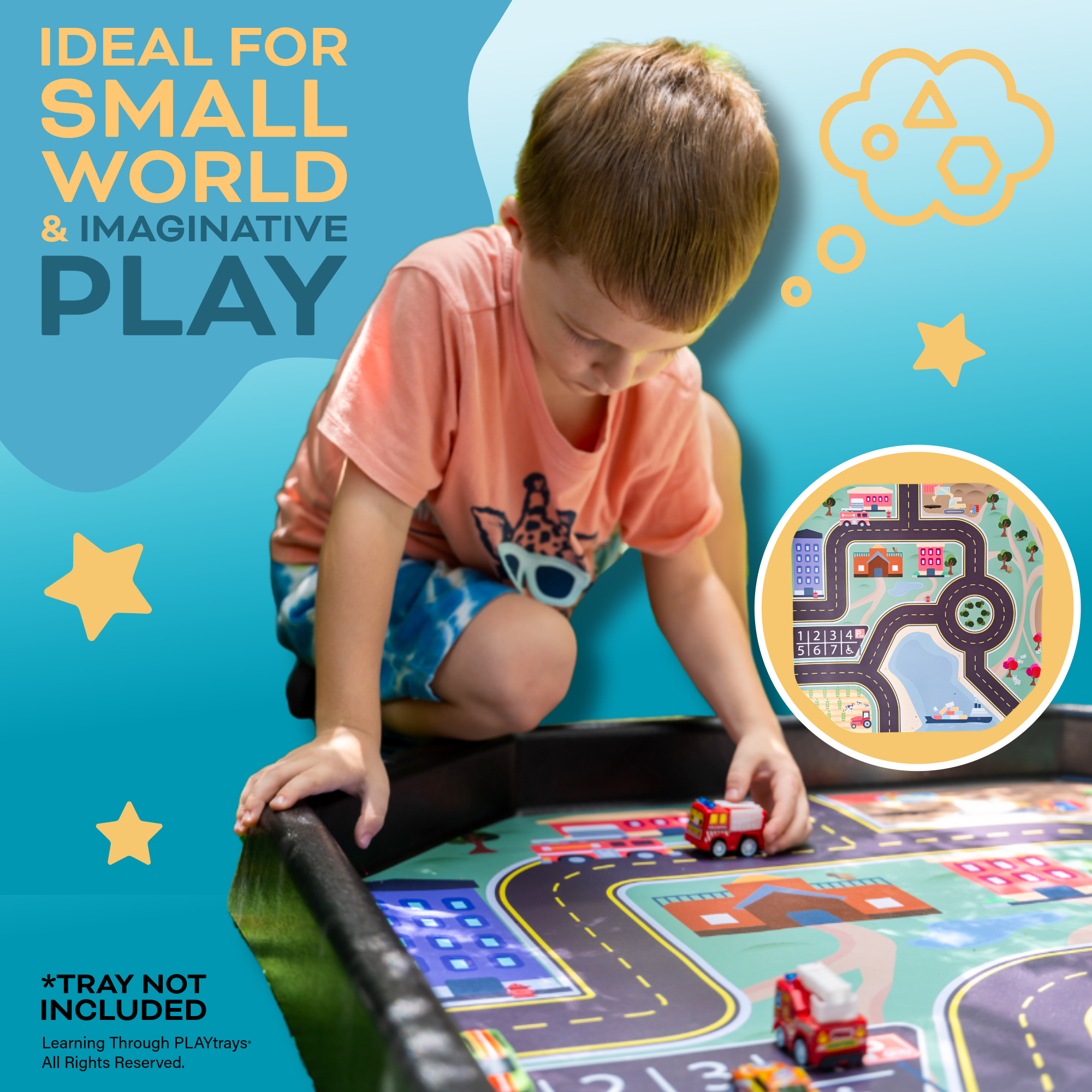 A boy playing with a Tuff Tray Insert 