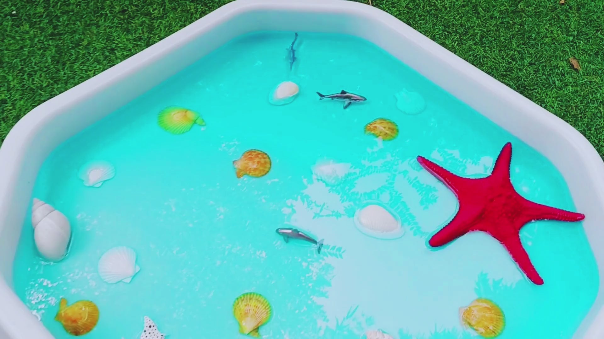 Small milky white Tuff Tray table for Reggio inspired sensory activities